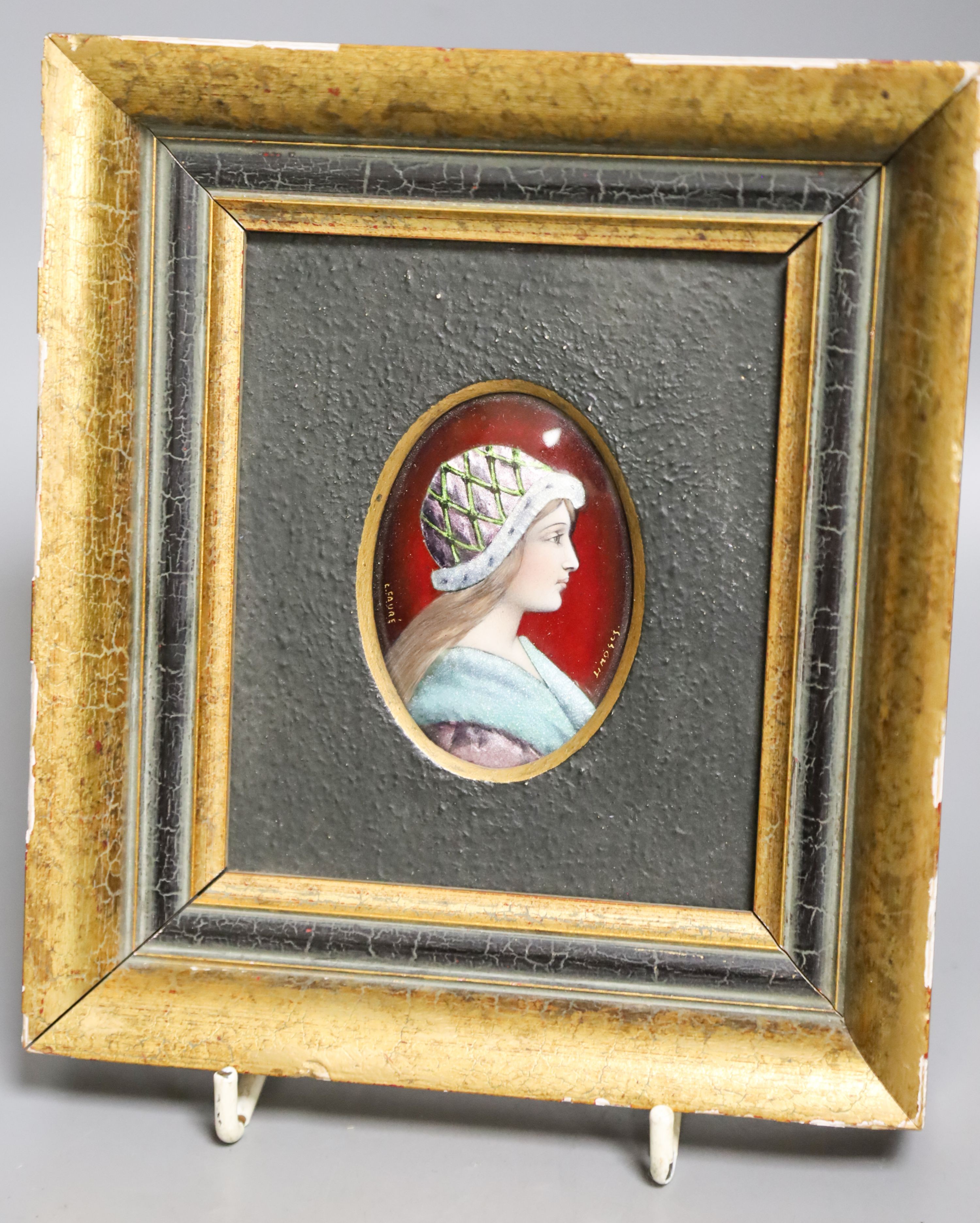 A small oval Limoges miniature enamelled portrait plaque, signed L. Fauré, framed 8x5.5cm excl frame